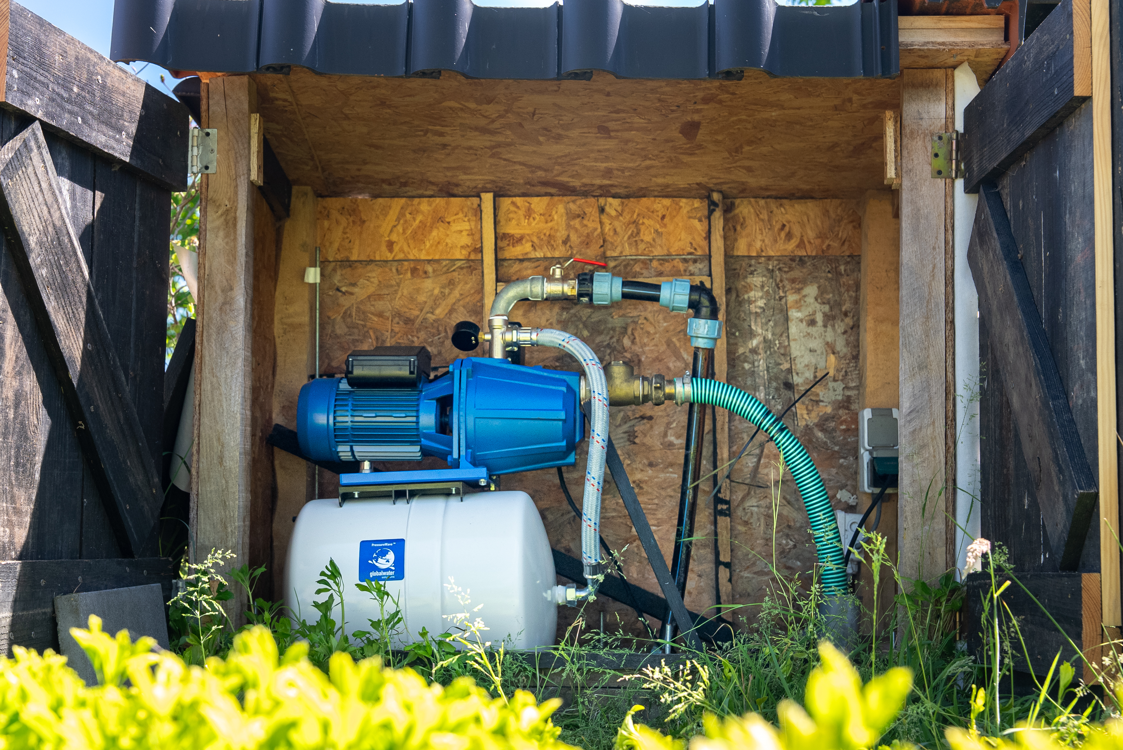 Automatische beregening Raalte – tuin met beplanting en gazon