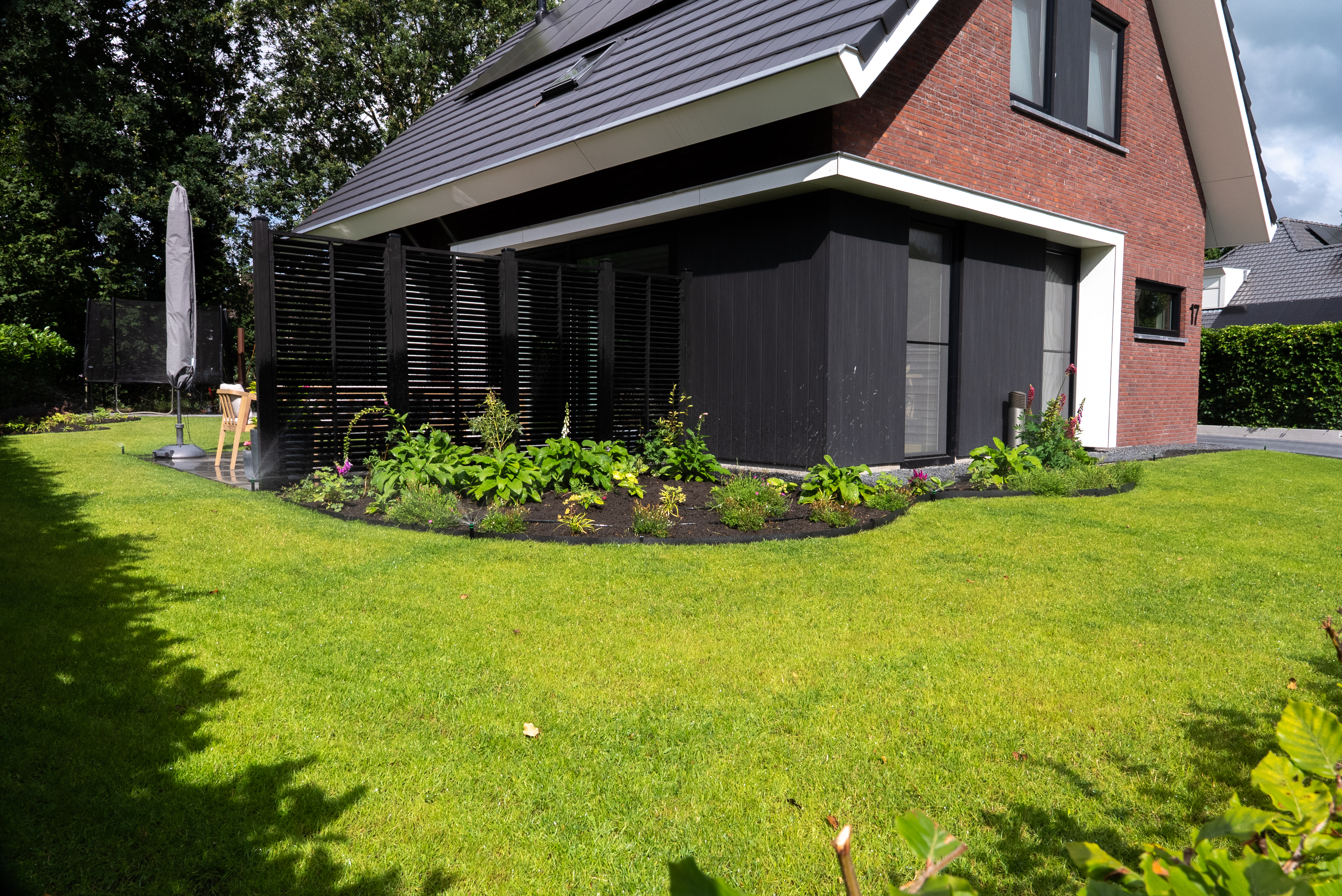 Tuin in IJhorst met een automatische beregeningsinstallatie
